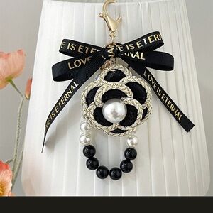 Black and Gold Keychain with Pearl Accent